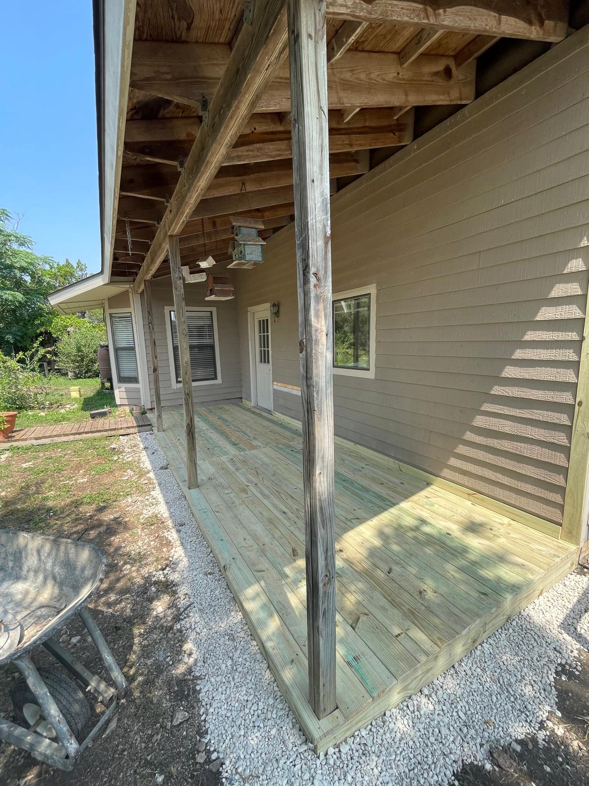 Covered porch deck built by Risen Remodeling