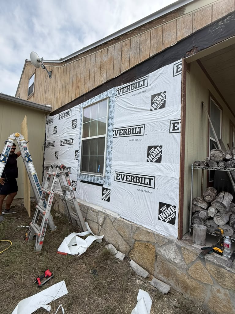 Exterior siding installation in progress by Risen Remodeling