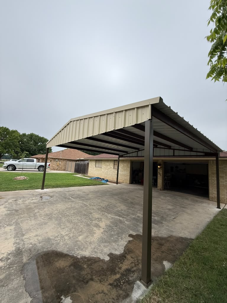 Custom metal carport built by Risen Remodeling