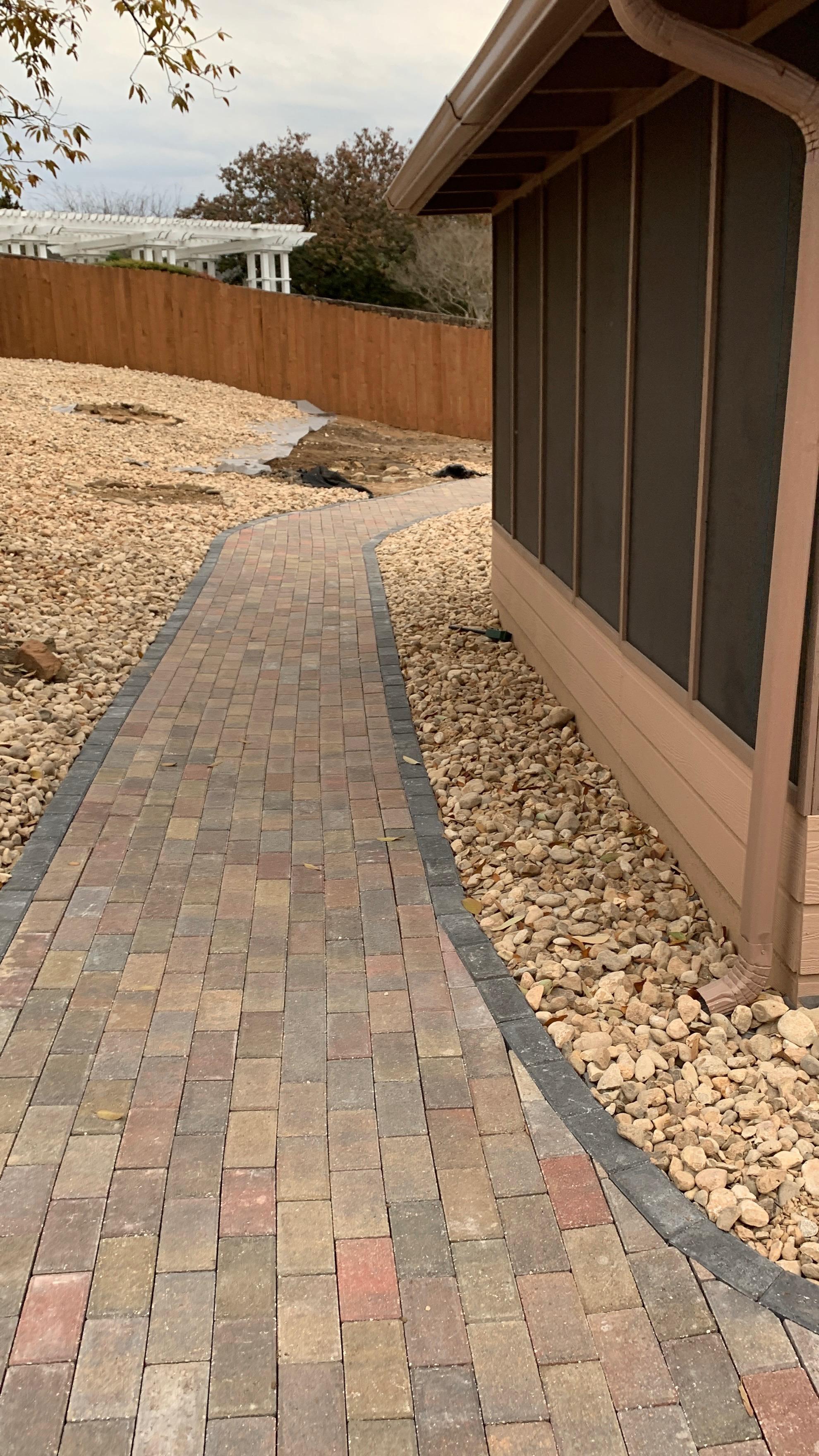 Custom paver walkway and landscaping by Risen Remodeling in New Braunfels TX