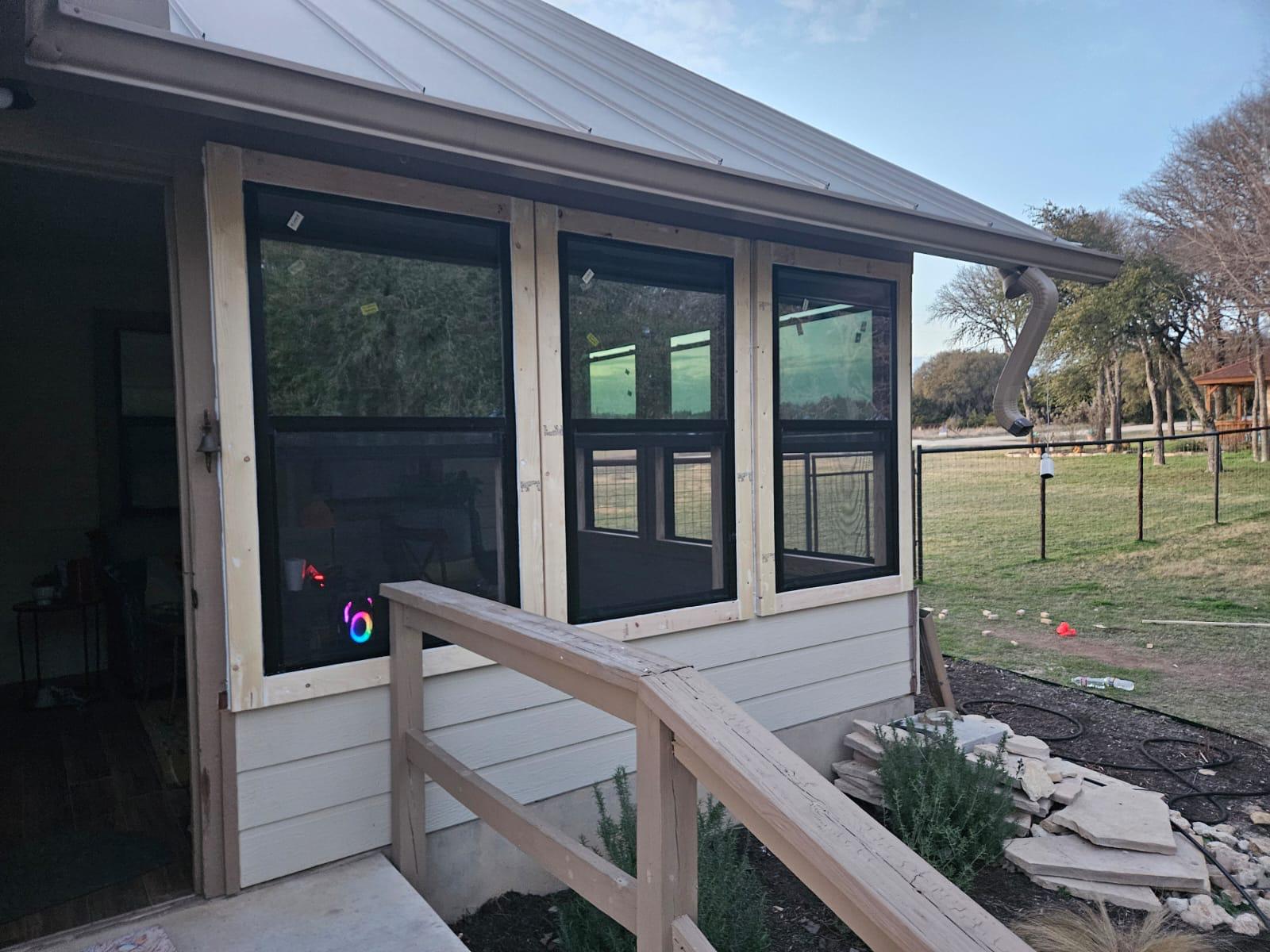 Screened porch addition with windows built by Risen Remodeling in New Braunfels, TX