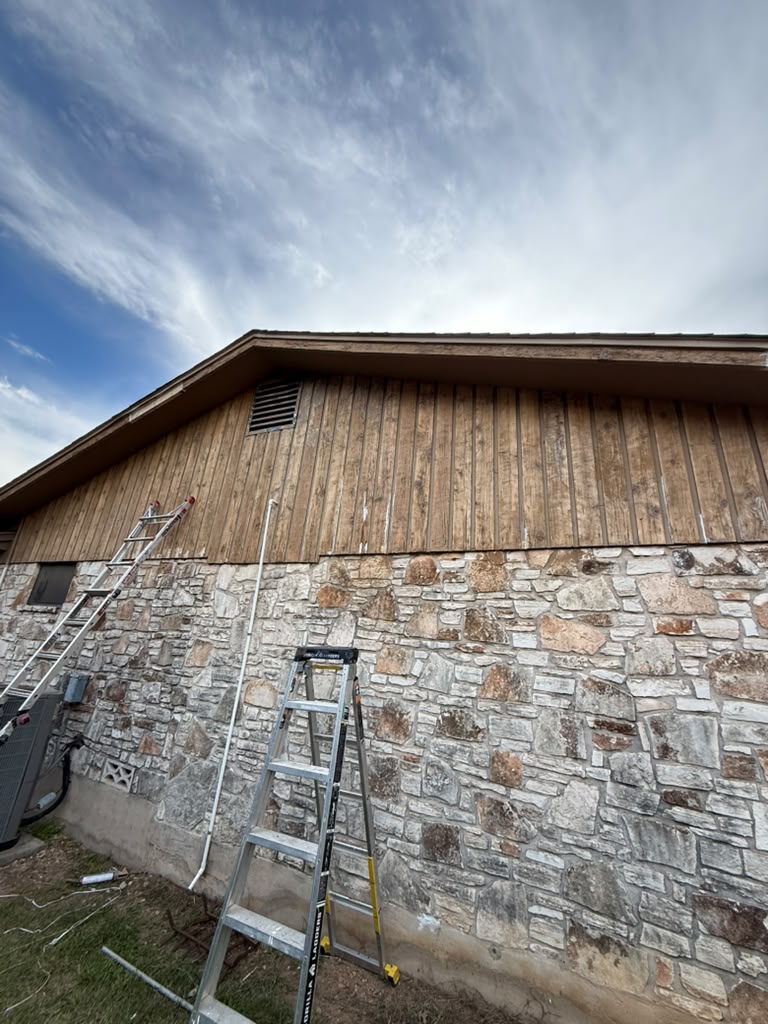 Stone and wood siding installation by Risen Remodeling
